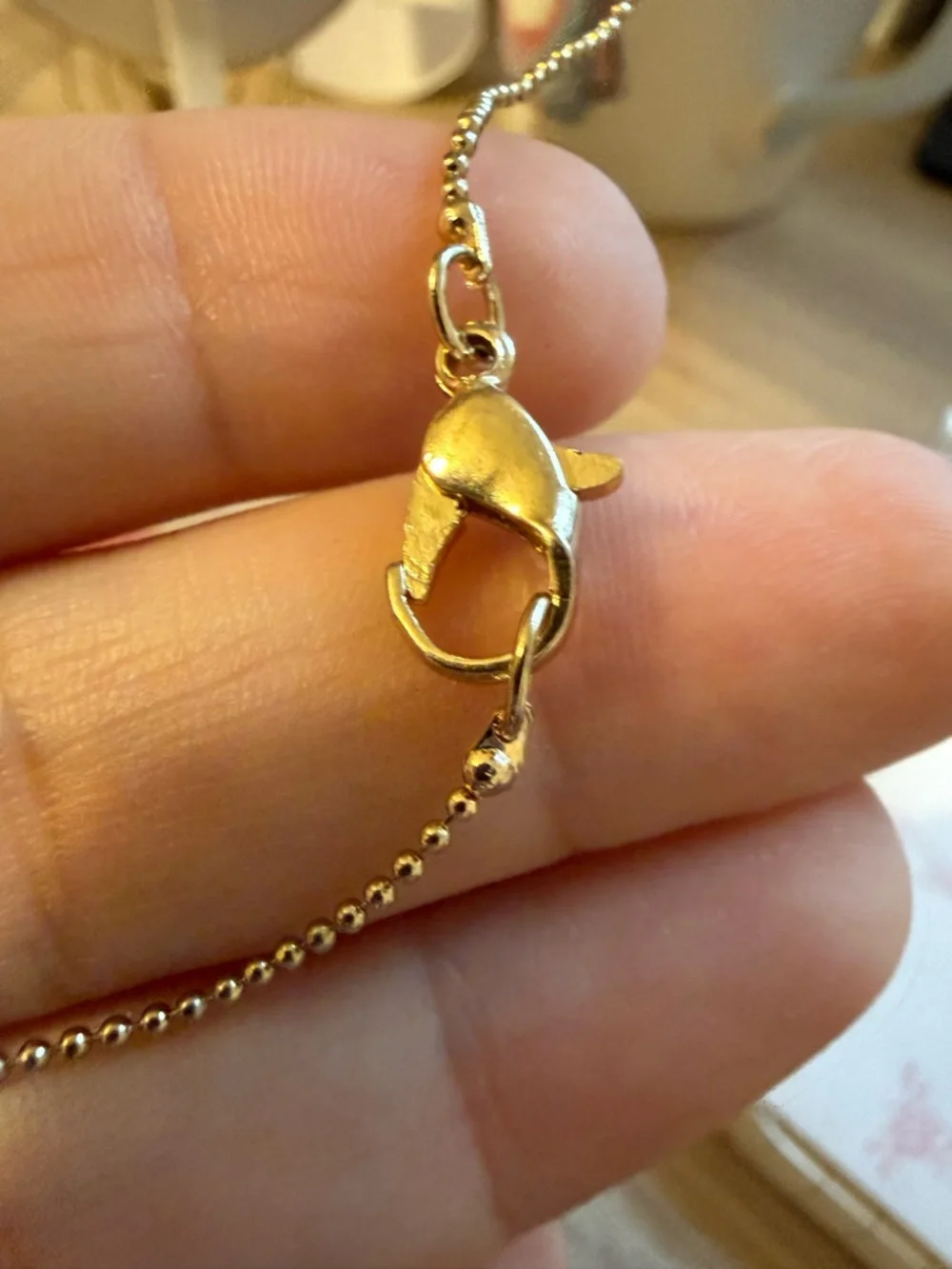 Gold-Tone Teal Triangle Pendant Tassel Necklace‎